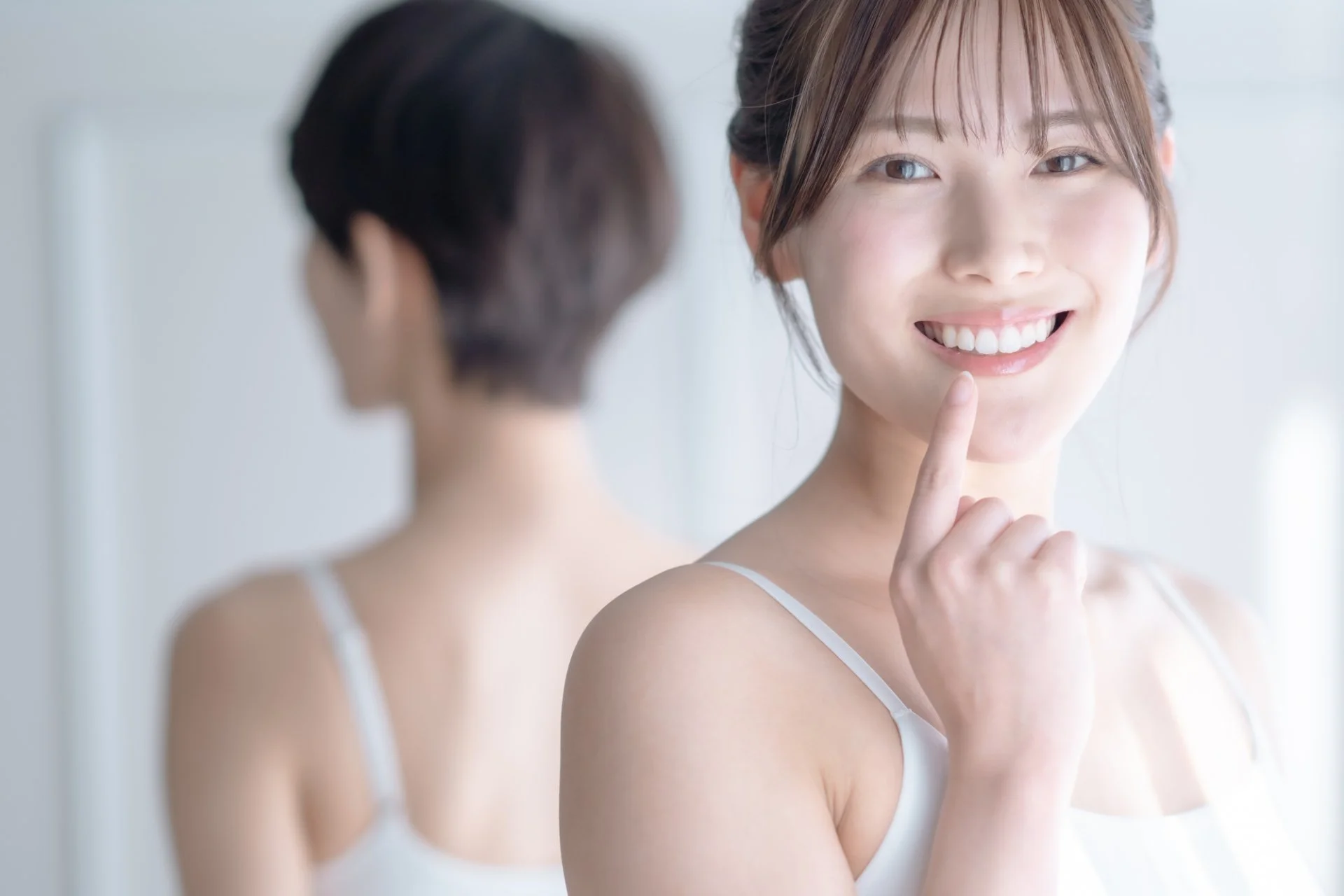 ホワイトニング施術を受ける様子を写した店内の写真